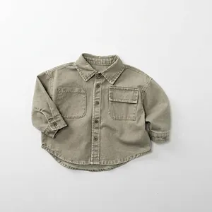 Detailed flat lay of an olive green cotton long sleeve shirt for kids with chest pockets