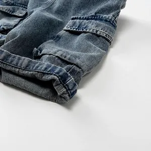Salopette en jean bleue pour enfants avec poches cargo et ourlets retroussés pour l'automne