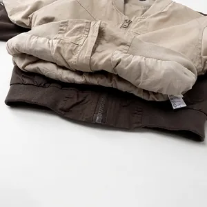 Casual Korean-style children's parkas in khaki and dark brown with zip-up design