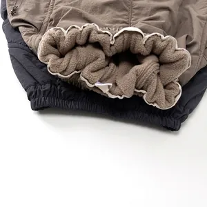 Winter fleece lined warm cargo pants for kids featuring elastic waist and side zip pockets
