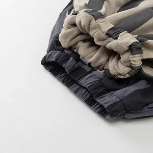 Thick fleece lined striped pants for kids with cozy warm inner fabric and elastic cuffs