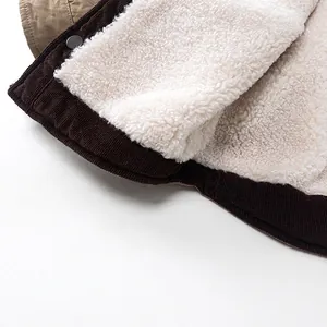 Kids reversible winter coat in brown corduroy with soft white fleece lining and metal snaps