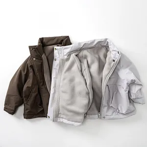 Detail view of thickened fleece lining and windproof collar on children winter jackets