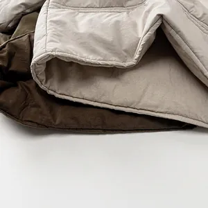 Quilted light cotton jacket for kids in cream and brown with soft padded texture