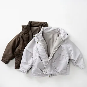 Detail showing thick fleece lining and durable zipper on children's winter windbreaker