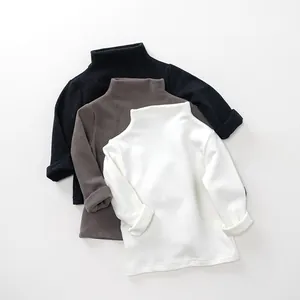 Detail view of premium ribbed knit fabric on kids turtle neck sweaters in three colors