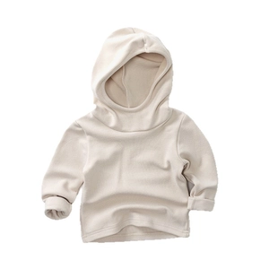 Minimalist kids hooded velvet sweatshirt in creamy apricot color with warm plush texture
