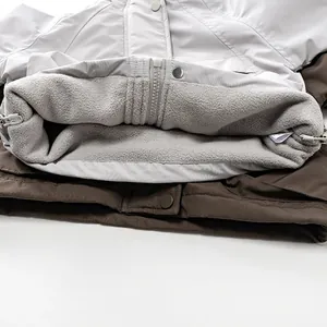 Kids thermal fleece-lined hooded jacket in cream and dark brown outdoor windbreaker