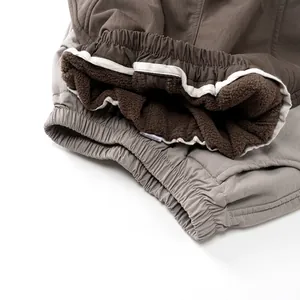Pantaloni invernali per bambini foderati in pile con vita elastica marrone e grigio