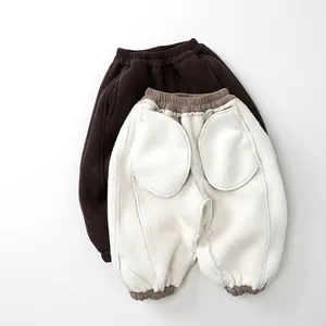 Kids thermal fleece joggers with soft lamb wool lining and elastic waistband in dark brown