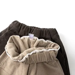 Kids fleece lined trousers in beige and brown with elastic waist for autumn and winter