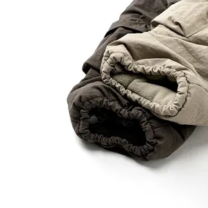 Winter fleece cargo pants for children in khaki and brown colors with elasticated cuffs