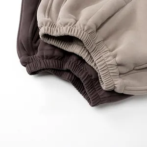 Detail showing elastic waistband and knit texture of thick fleece children trousers