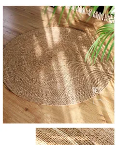 Close-up of natural round woven seagrass rug showing detailed spiral braid texture