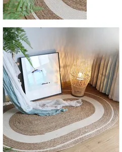 Detailed close-up of oval woven jute rug featuring a natural white spiral texture