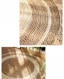 Close-up of handmade round woven seagrass rug with natural concentric circle textures