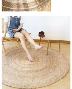Detail of hand-woven round jute rug featuring natural spiral texture in home setting