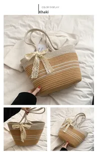 Detailed macro view of the khaki striped woven texture and beige lace bow on beach tote