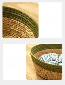 Detailed view of durable woven cat bed with green reinforced edges and wave pattern cushion