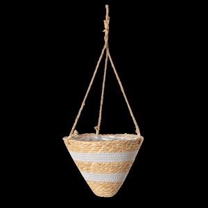 Detail of hanging wicker planter with waterproof lining and natural fiber texture