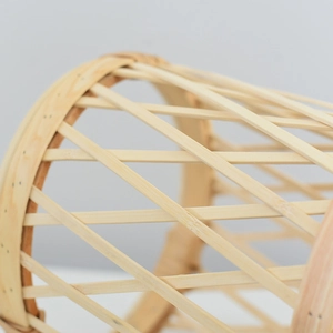 Macro shot of natural bamboo weaving patterns and round frame on the plant stand