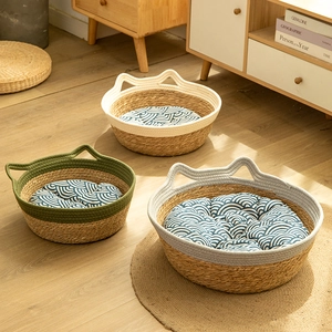 Handwoven woven cat bed with ear handles and wave pattern cushions in three colors