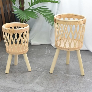 Nordic woven plant stand set with natural rattan baskets and wooden tripod legs