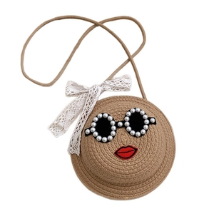 Cute round woven straw crossbody bag for girls with sunglasses and lace bow detail