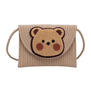 Cute woven straw envelope crossbody bag with plush bear decor for summer beach beach vacation