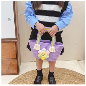 Kids purple woven cotton handbag featuring a colorful sun flower and rainbow strap