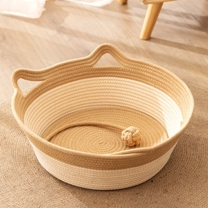 Handwoven cat bed with cute ears in beige cotton rope featuring a hanging play ball toy