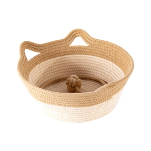 Dual-tone woven jute pet bed featuring cat ear handles and a knotted rope toy inside