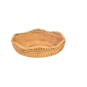 Handmade woven rattan basket tray with wavy edges for kitchen fruit and bread storage