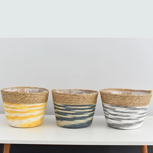 Handwoven straw flower pot cover in natural yellow blue grey stripes with liner