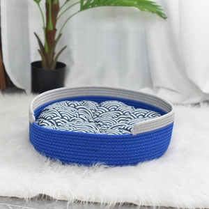 Panier pour chat tissé en coton bleu et gris avec coussin moelleux à motif ondulé