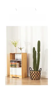 Detail of hand-woven seagrass planter with black net design for indoor home decor