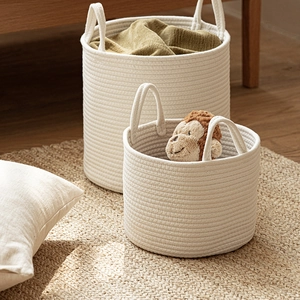 Set of two white cotton rope storage baskets with handles for laundry and toys
