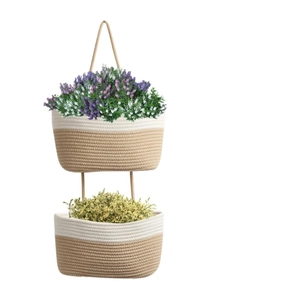 Handwoven 2-tier hanging basket in white and brown cotton rope for wall storage
