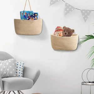 Detail of woven cotton rope wall baskets showing minimalist texture and hanging design
