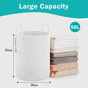 Detail of 58L white woven cotton laundry basket showing 50x38cm size and wood bead decor