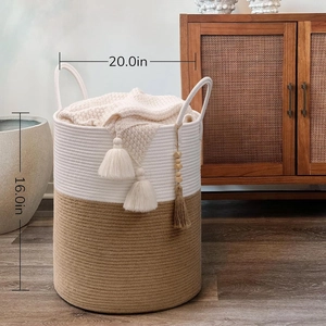 Detail of 20x16 inch woven cotton rope laundry basket with tassels and wood beads