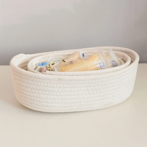 Oval hand-woven cotton rope storage baskets set for organizing cosmetics and snacks