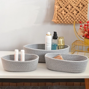 Three-piece set of gray cotton rope woven storage baskets in small medium large sizes