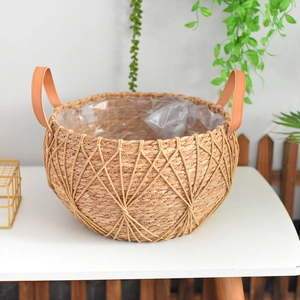 Nordic handmade woven seagrass planter with leather handles and waterproof lining