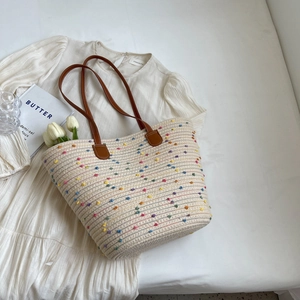 Woven cotton shoulder bag with colorful polka dots and brown leather straps