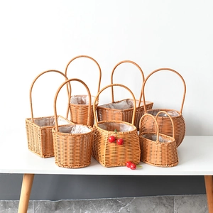 Handwoven flower baskets in various shapes with waterproof liners and sturdy handles