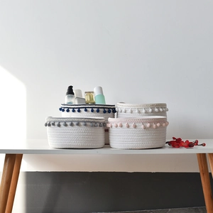 Minimalist cotton rope storage baskets set with colorful pom-pom decor for desk organization