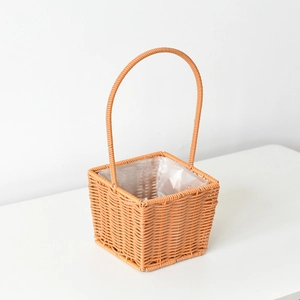 Close-up of handwoven square flower basket with waterproof plastic lining for floral display
