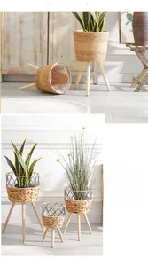Close-up of Nordic straw flower pot with wooden legs and waterproof liner details