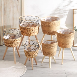 Set of 6 Nordic woven grass flower stands with solid wood legs and waterproof liners